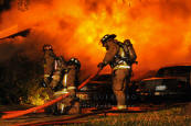 Firefighters Battle House Fire in Houston